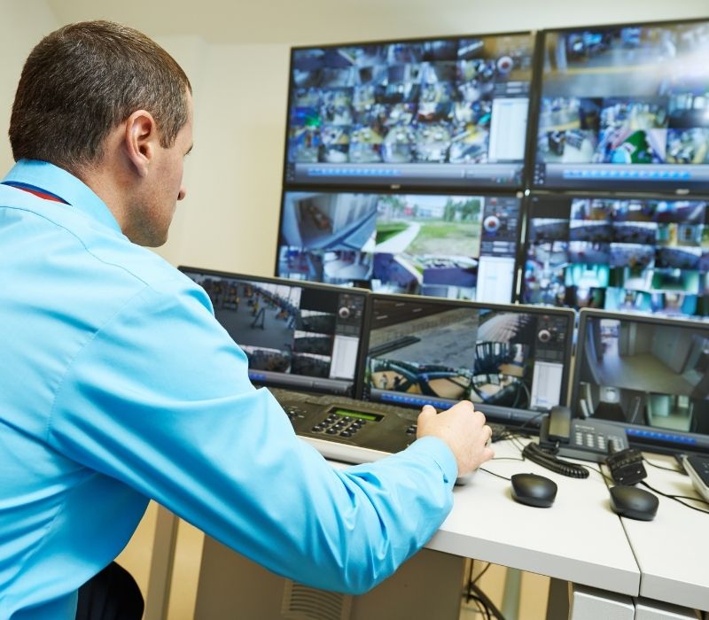 security manager monitoring camera feeds